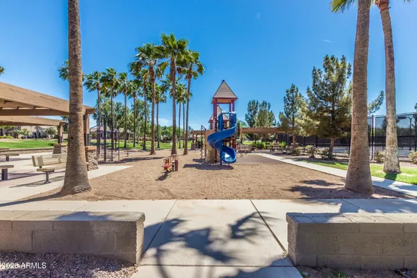 a view of a park with houses