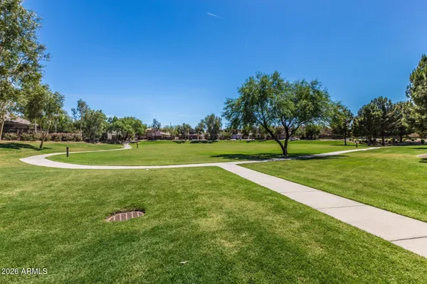 a view of a park with benches