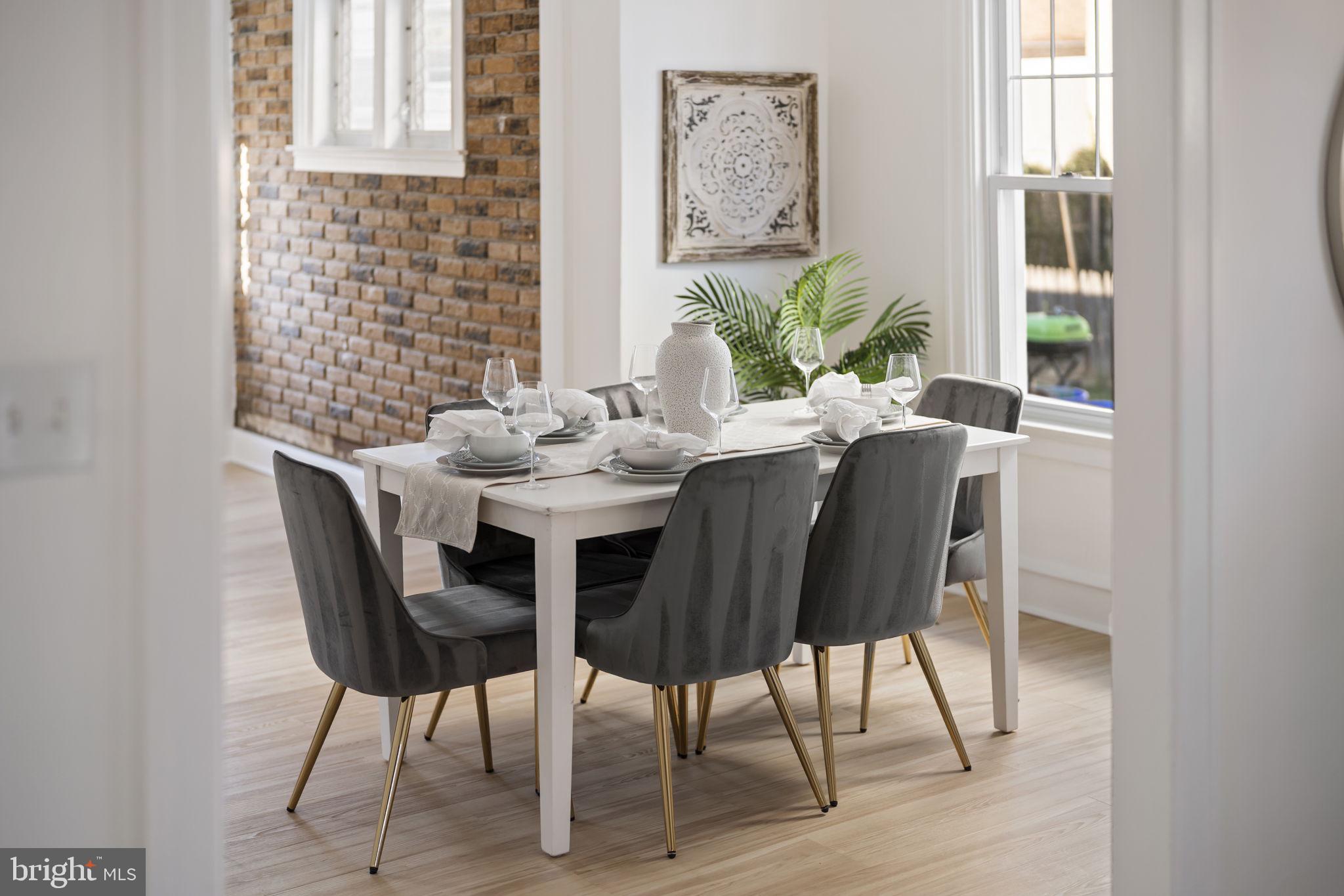 2517 Marshall Road Drexel Hill, PA 19026 - Photo 11 of 29 a view of a dining room with furniture and wooden floor