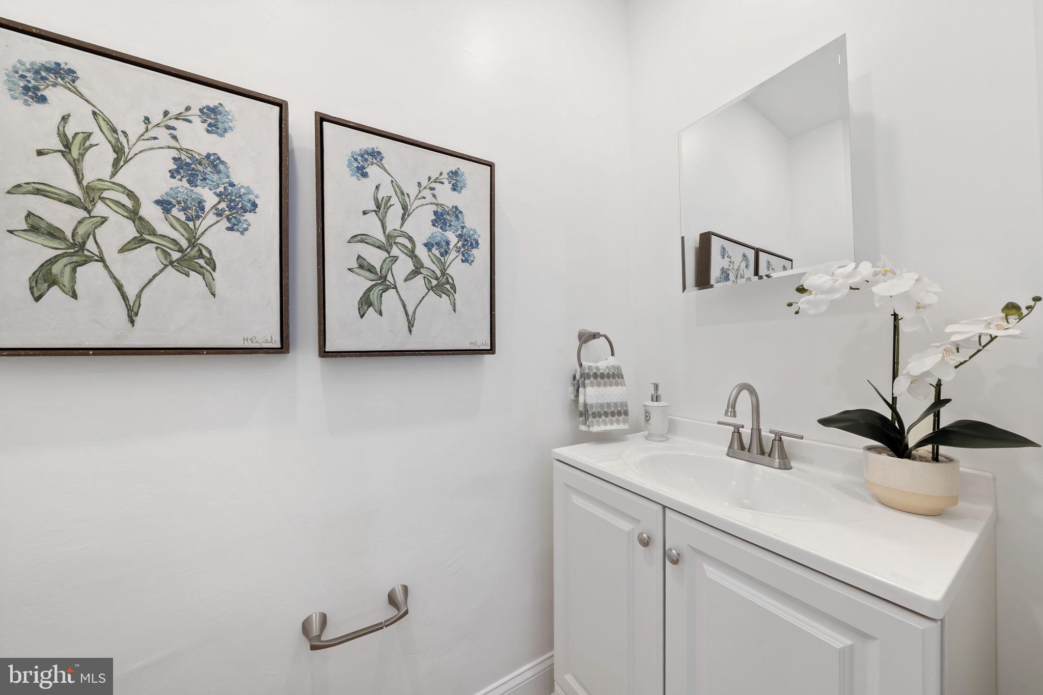 2517 Marshall Road Drexel Hill, PA 19026 - Photo 18 of 29 a bathroom with a sink and a mirror