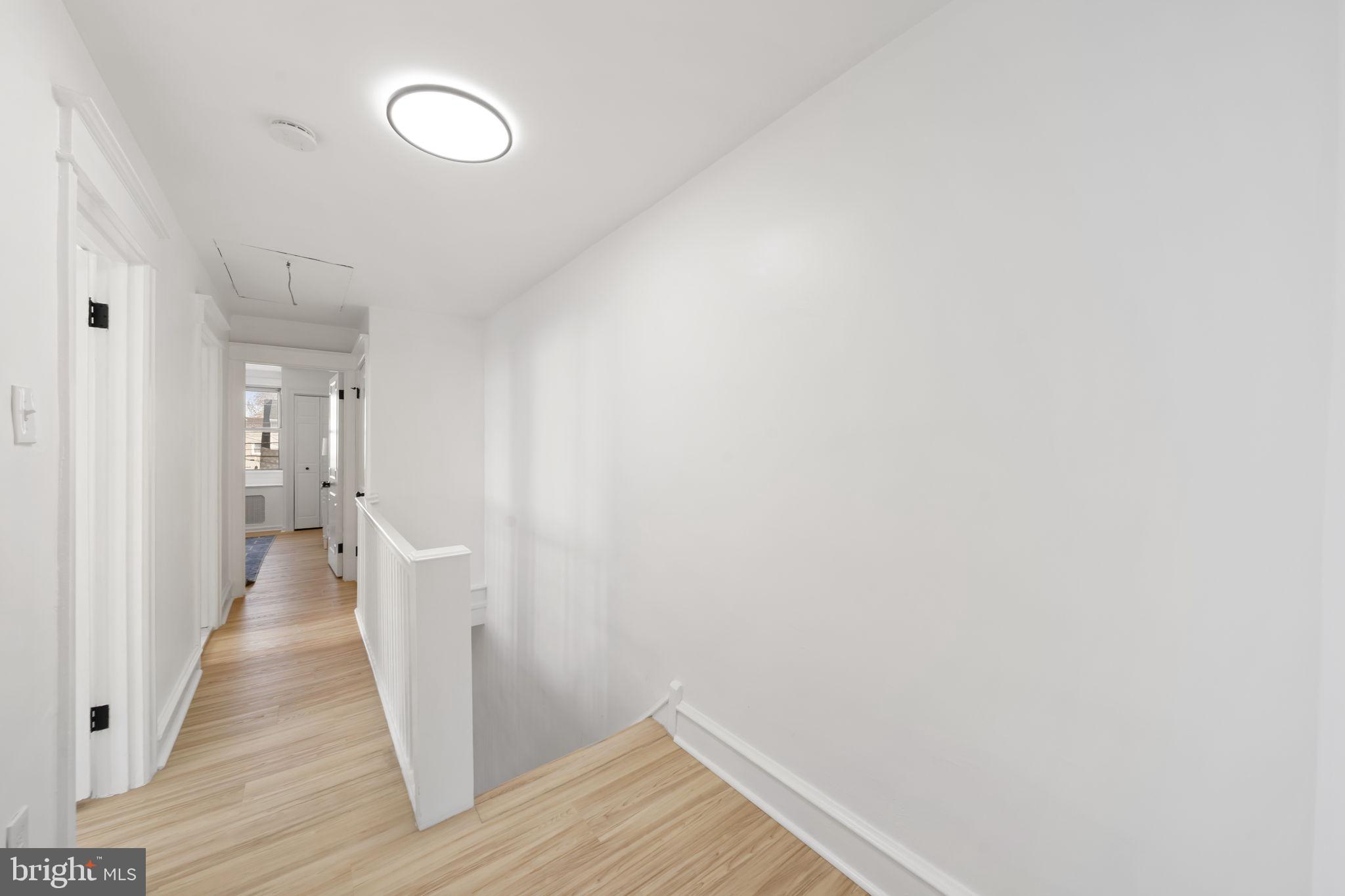 2517 Marshall Road Drexel Hill, PA 19026 - Photo 22 of 29 a view of a hallway with wooden floor