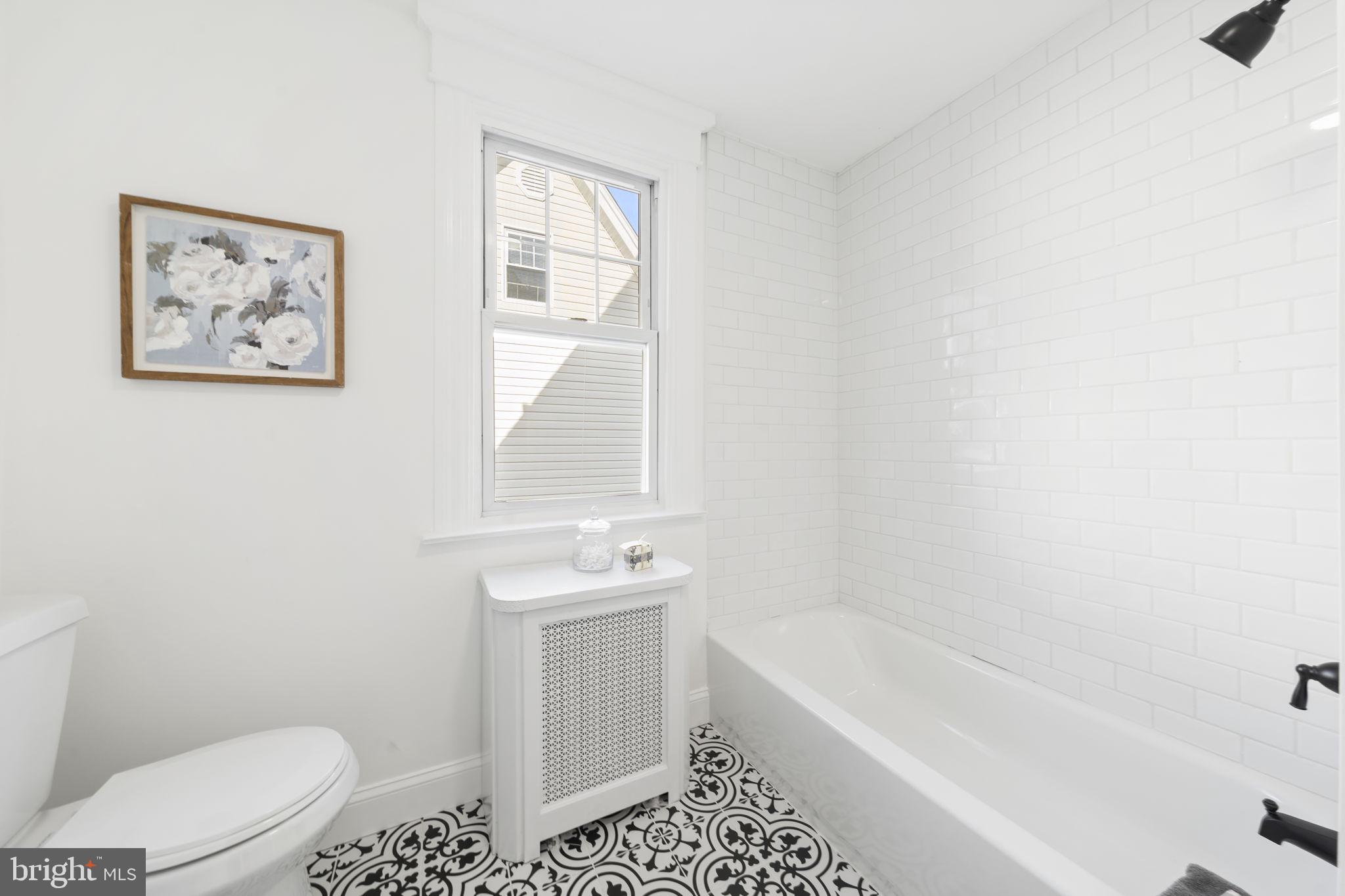 2517 Marshall Road Drexel Hill, PA 19026 - Photo 24 of 29 a bathroom with a toilet a sink and bathtub
