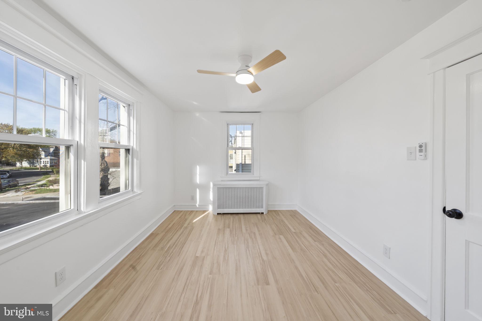 2517 Marshall Road Drexel Hill, PA 19026 - Photo 27 of 29 wooden floor in an empty room with a window