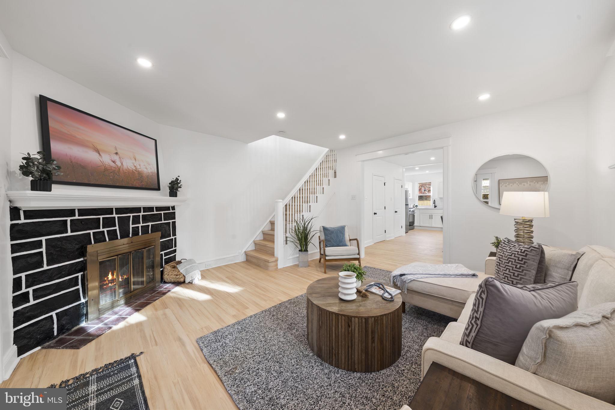 2517 Marshall Road Drexel Hill, PA 19026 - Photo 8 of 29 a living room with furniture and a flat screen tv