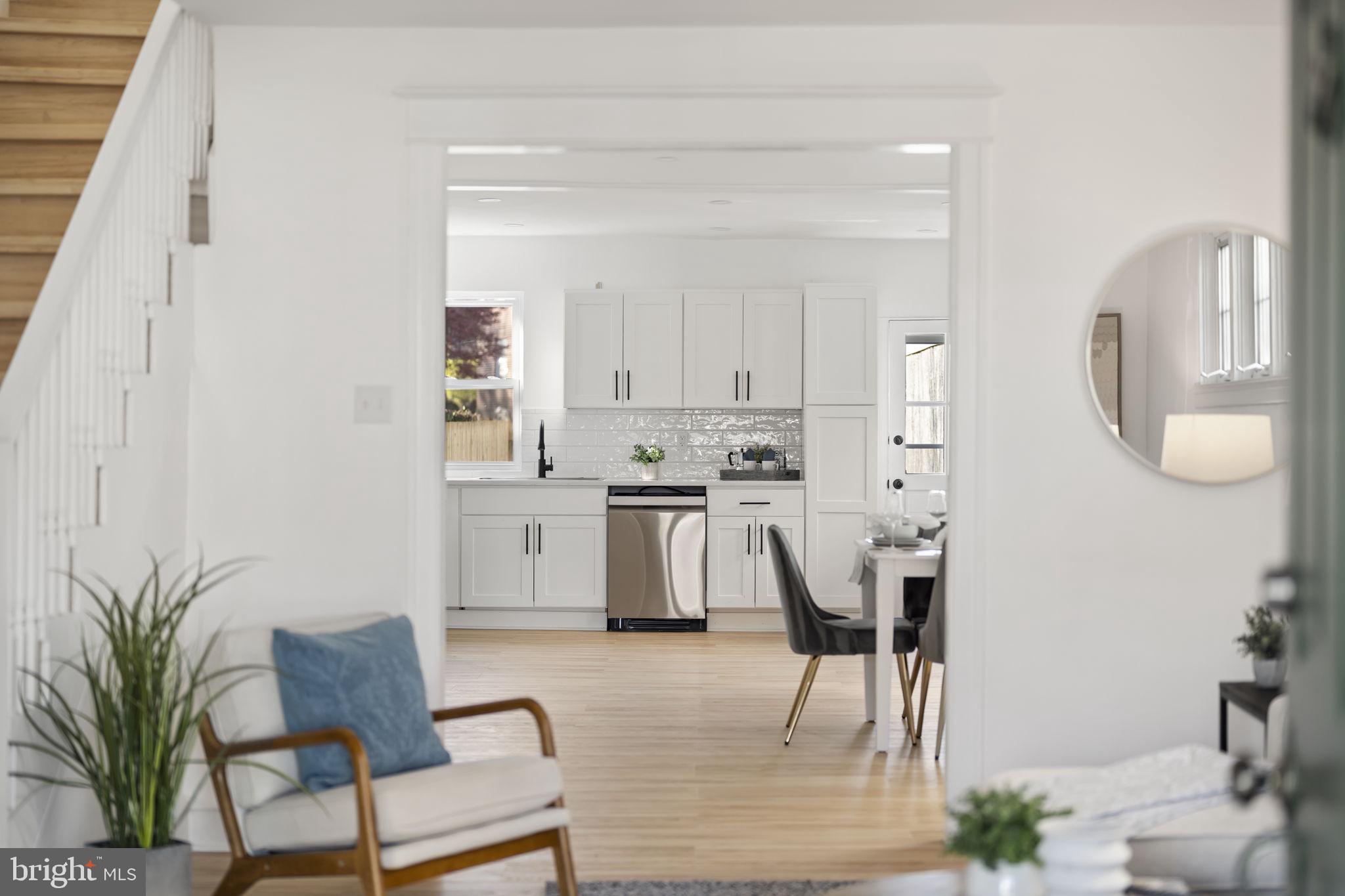 2517 Marshall Road Drexel Hill, PA 19026 - Photo 9 of 29 a kitchen with granite countertop white cabinets and stainless steel appliances