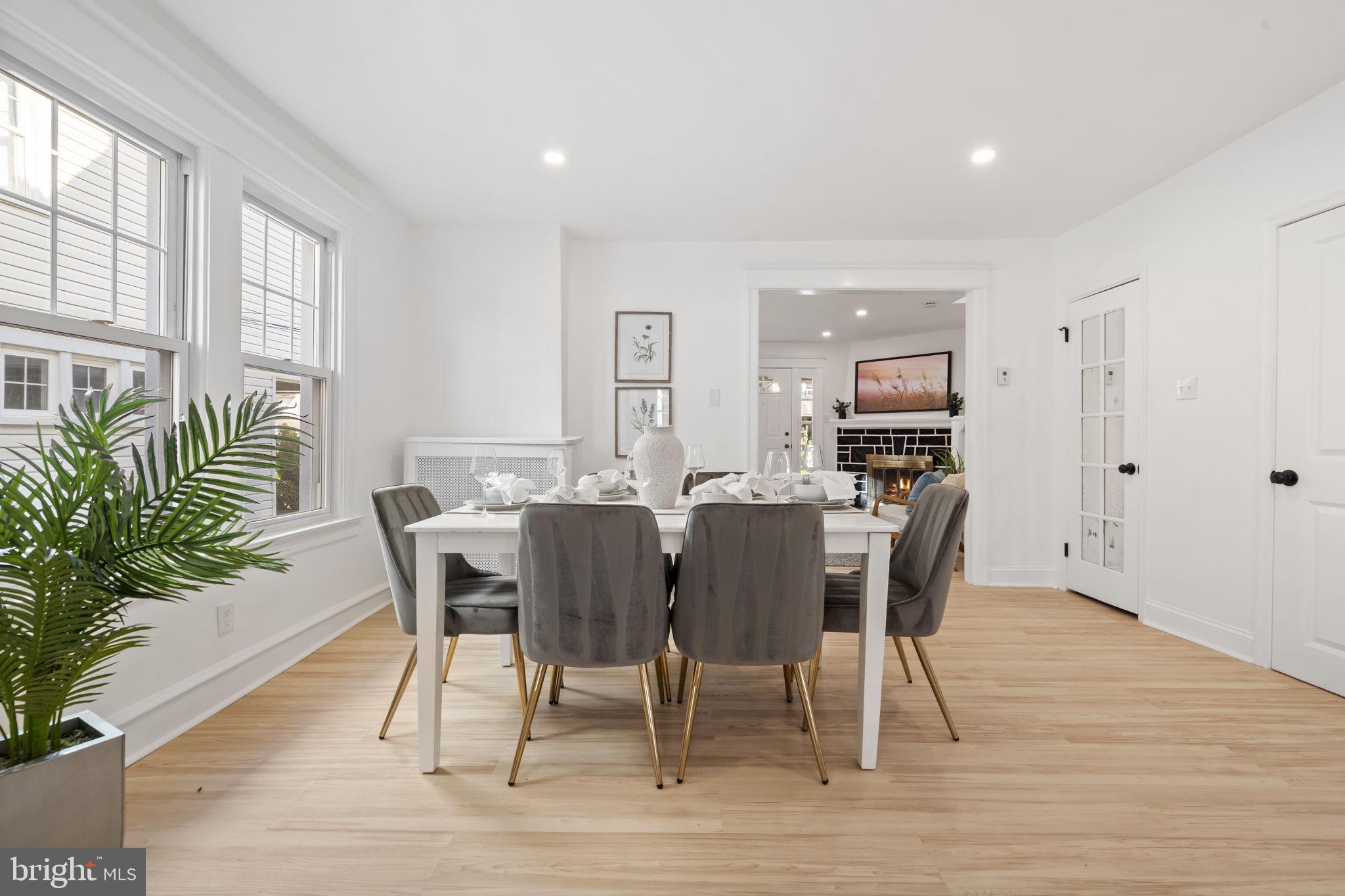 2517 Marshall Road Drexel Hill, PA 19026 - Photo 10 of 29 a view of a a dining room with furniture window and wooden floor