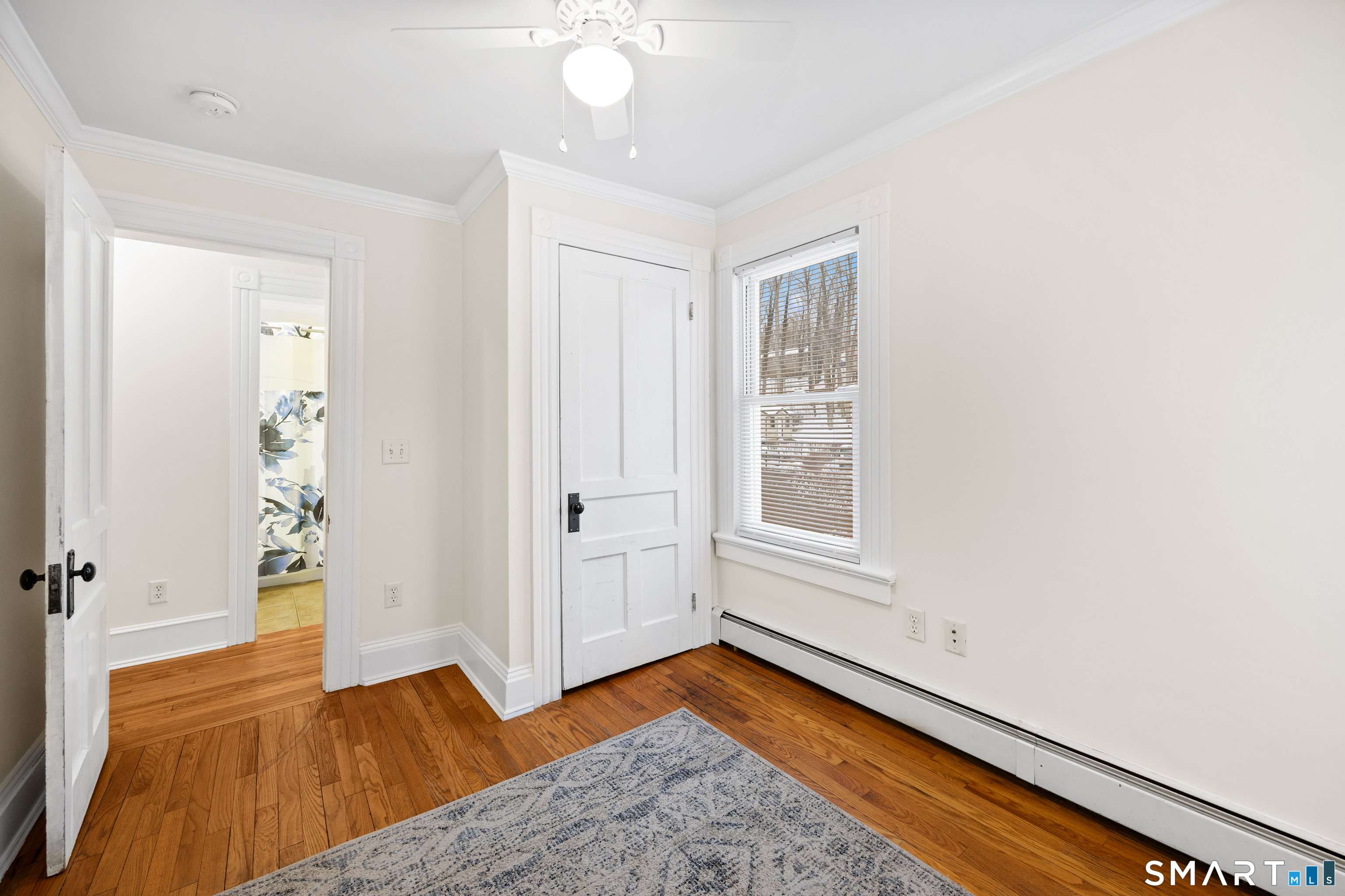 60 Guilford Street Torrington, CT 06790 - Photo 16 of 27 a view of room with window and hardwood floor