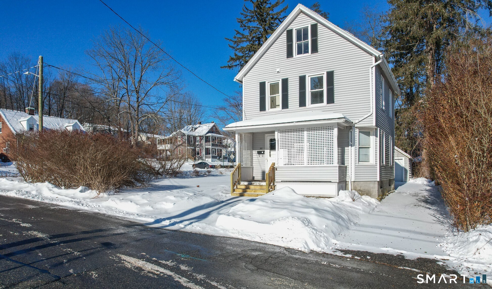 60 Guilford Street Torrington, CT 06790 - Photo 2 of 27 a front view of a house with a yard