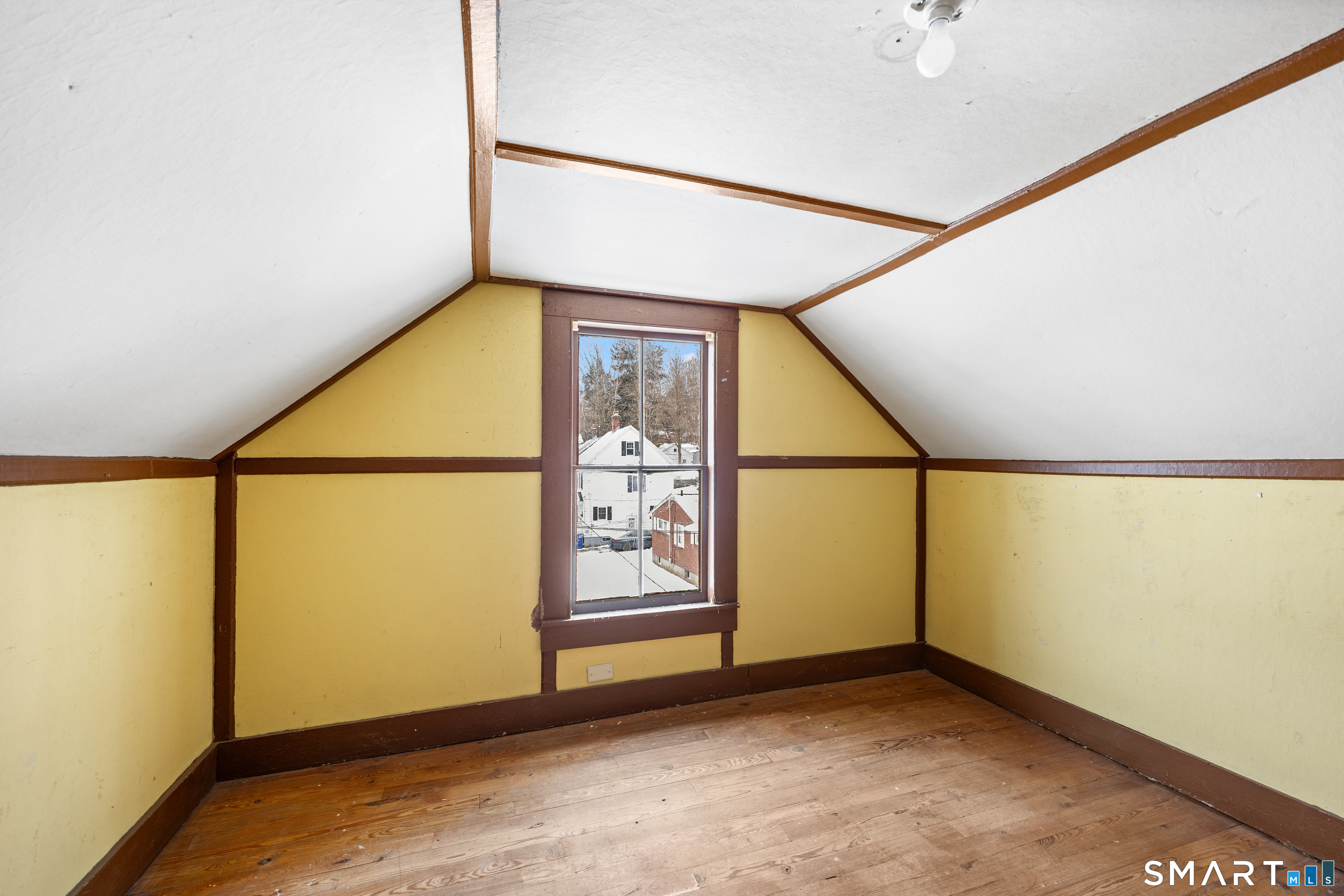 60 Guilford Street Torrington, CT 06790 - Photo 21 of 27 a view of an empty room with a window