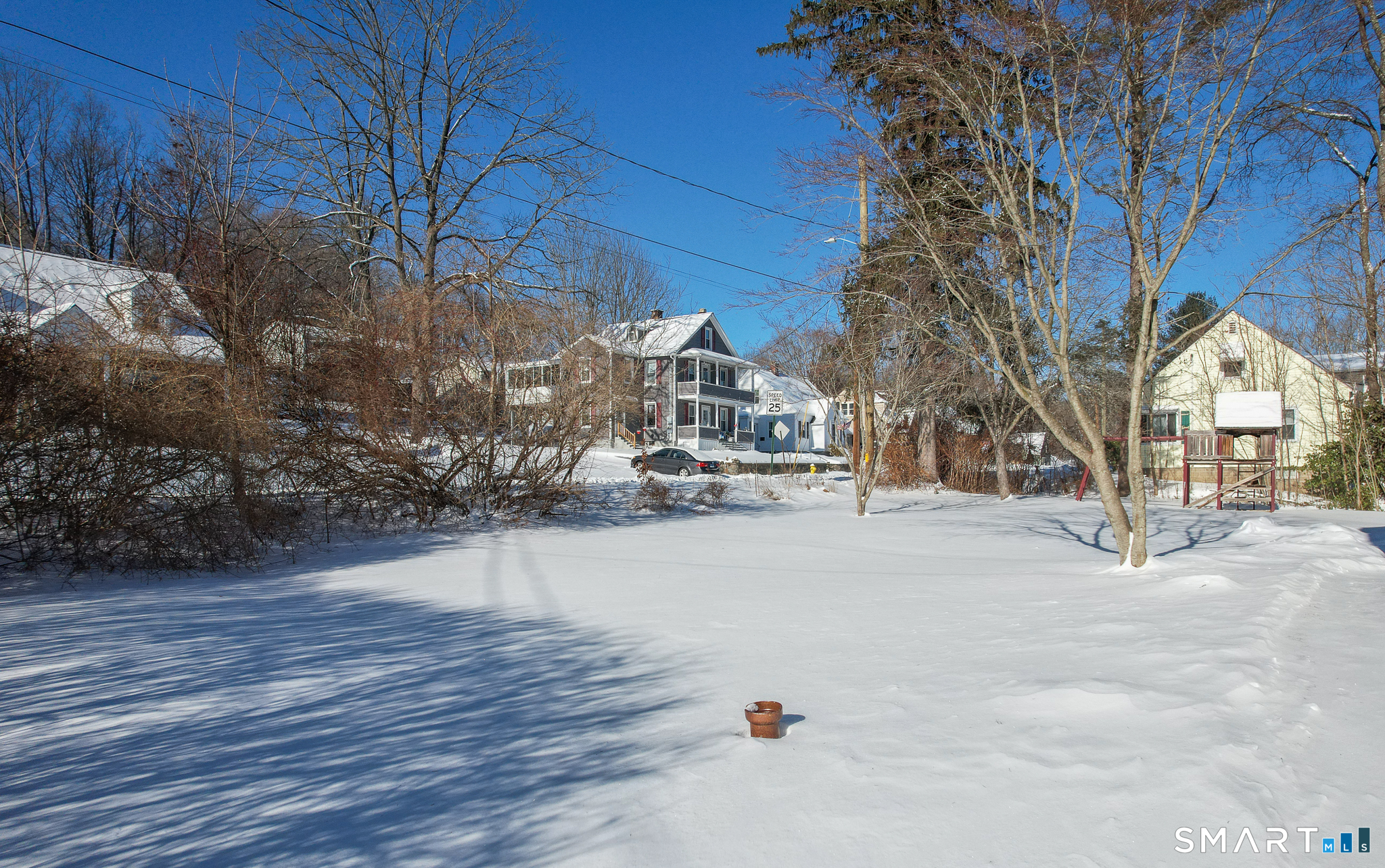 60 Guilford Street Torrington, CT 06790 - Photo 23 of 27 a view of a house with a snow in the yard