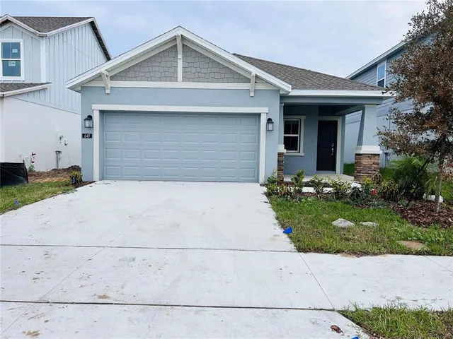 a front view of house with yard