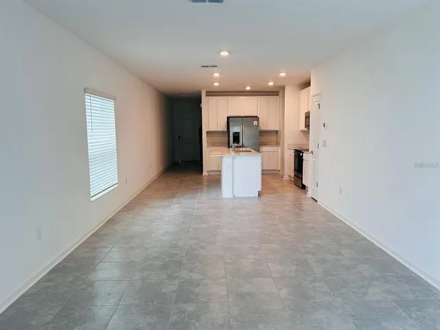 a view of kitchen and living room