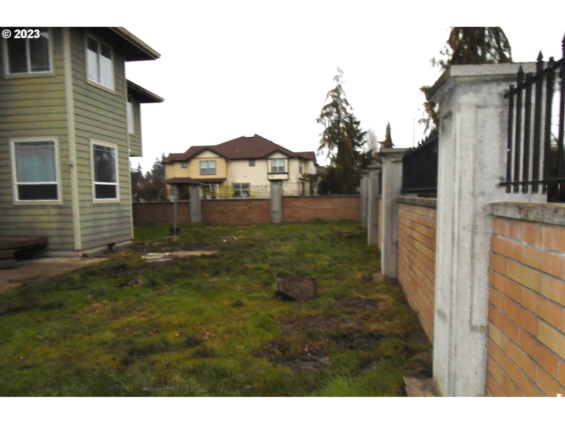 1710 South Dusky Drive Ridgefield, WA 98642 - Photo 15 of 16 a backyard of a house with lots of green space