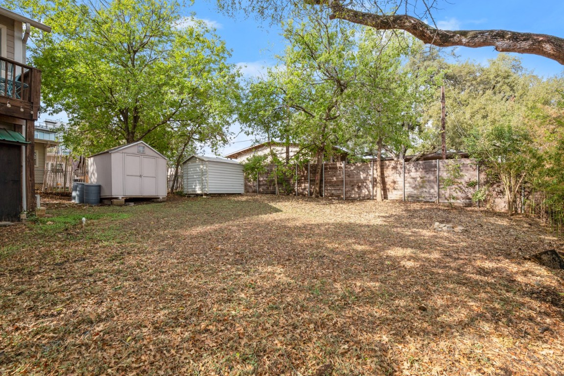 1406 Summit Street Austin, TX 78741 - Photo 25 of 32 a house with trees in the background