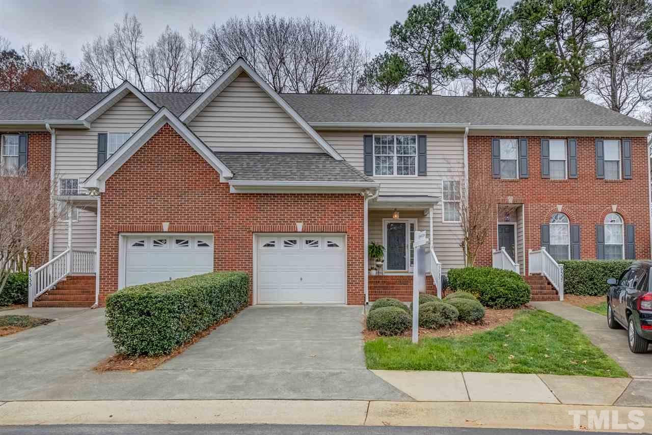 9535 Hanging Rock Road Raleigh, NC 27613 - Photo 1 of 27 a front view of a house with garden