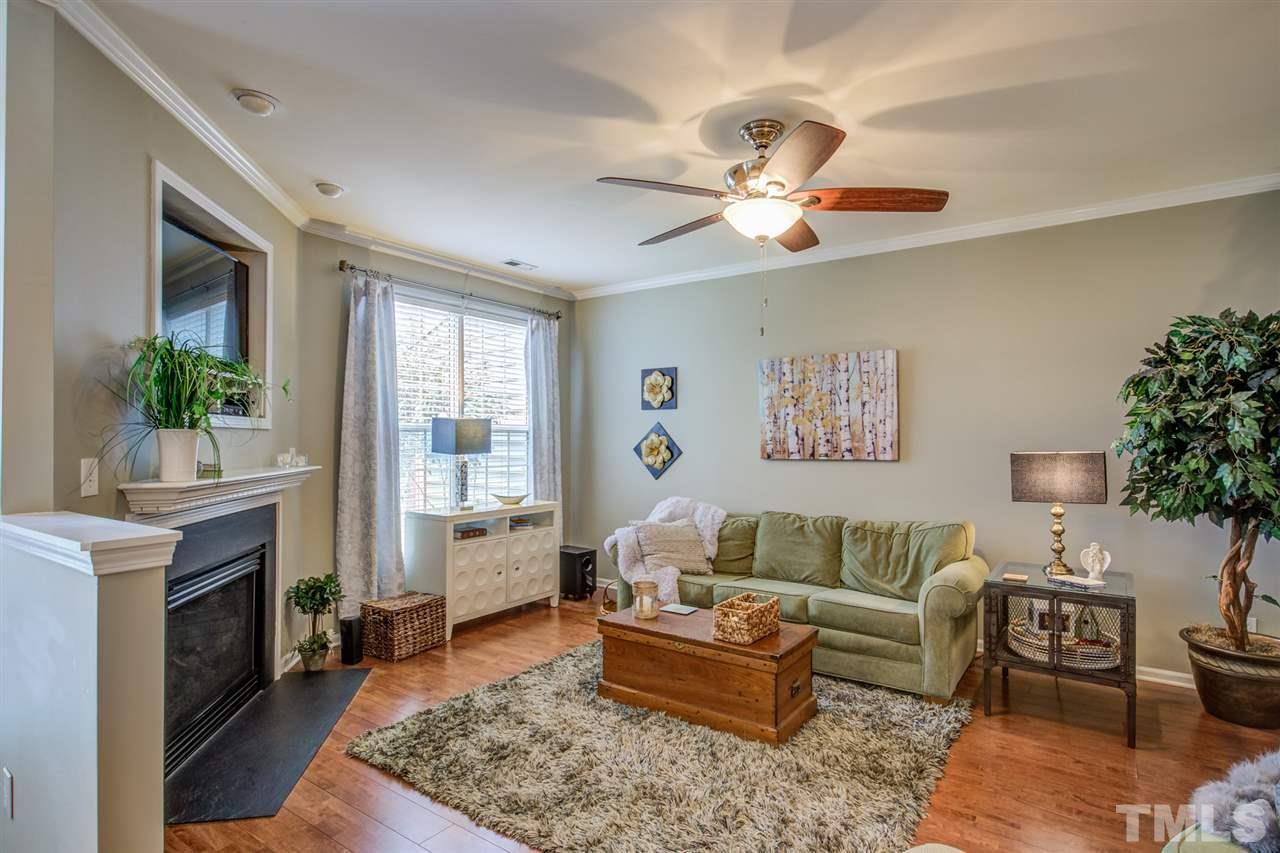 9535 Hanging Rock Road Raleigh, NC 27613 - Photo 5 of 27 a living room with furniture and a fireplace