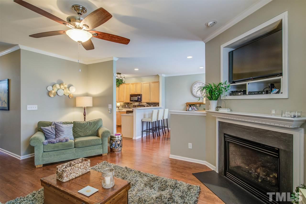 9535 Hanging Rock Road Raleigh, NC 27613 - Photo 6 of 27 a living room with furniture and a fireplace