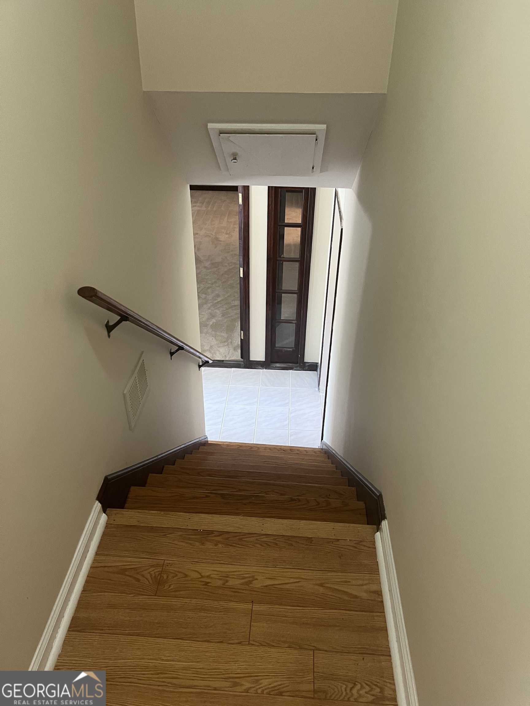 4910 Thompson Mill Road Lithonia, GA 30038 - Photo 26 of 28 a view of a room with a staircase