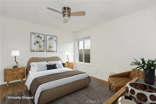 a bedroom with a bed and window
