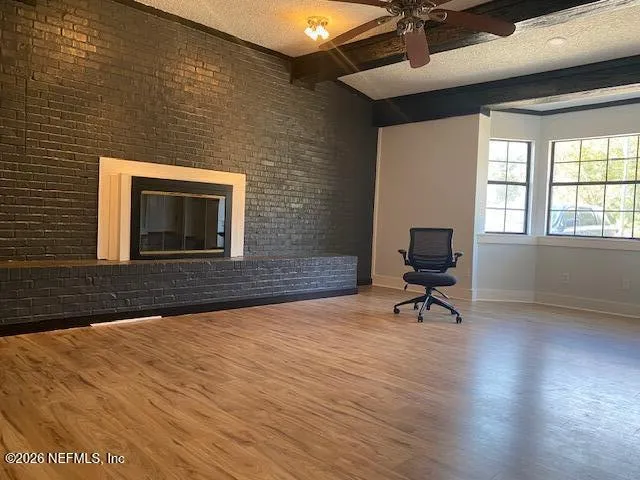 a bathroom with a tub and a shower