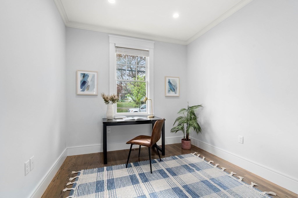 154 Spring Street, Unit 154 Watertown, MA 02472 - Photo 12 of 27 a workspace with furniture and window