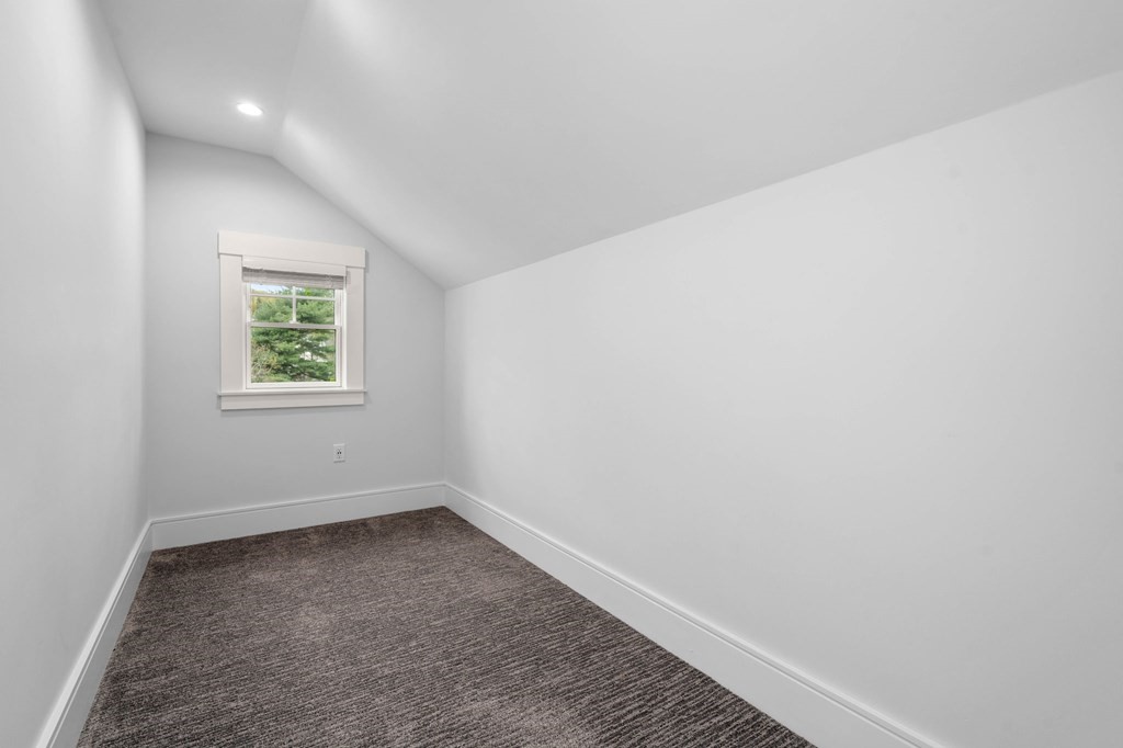 154 Spring Street, Unit 154 Watertown, MA 02472 - Photo 23 of 27 an empty room with windows