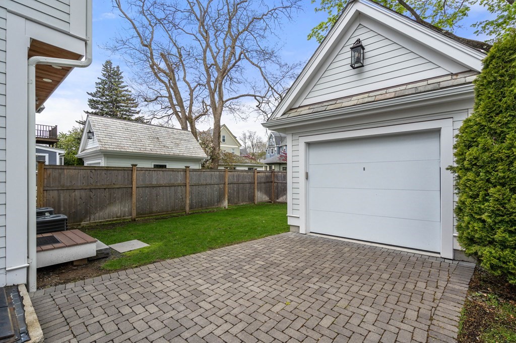154 Spring Street, Unit 154 Watertown, MA 02472 - Photo 26 of 27 a backyard of a house