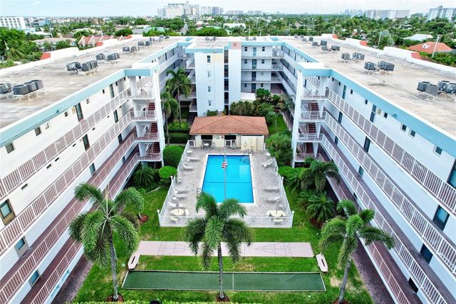 a view of building with yard