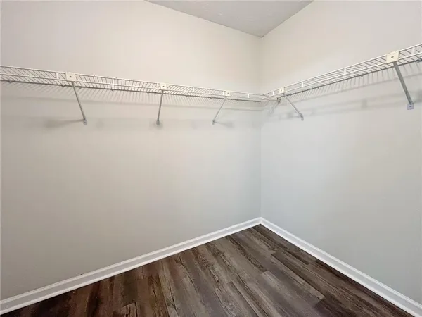 a view of a room with racks on the wall