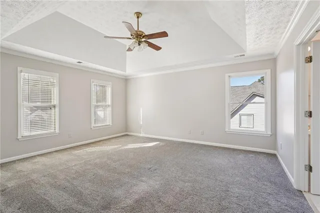 a view of a house with roof deck front of house