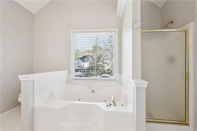 an aerial view of a house with outdoor space