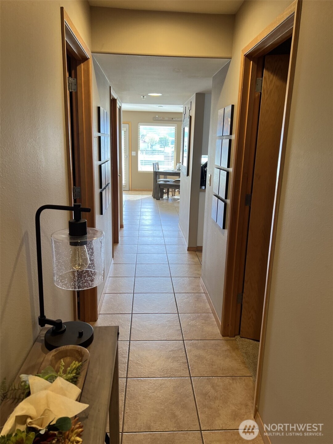 8997 Crescent Bar Road Northwest, Unit C118 Quincy, WA 98848 - Photo 15 of 33 a view of a hallway with furniture and front door
