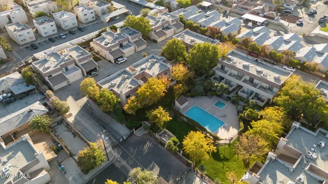 an aerial view of a house with outdoor space