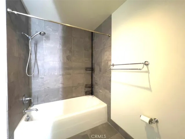 a bathroom with a white bath tub