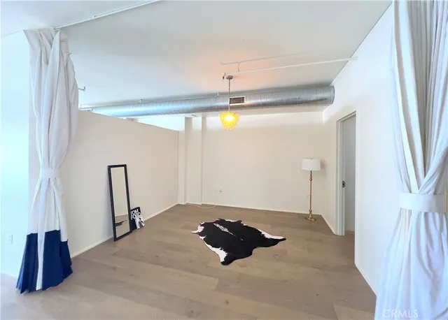 a bedroom with a bed and a walk in closet