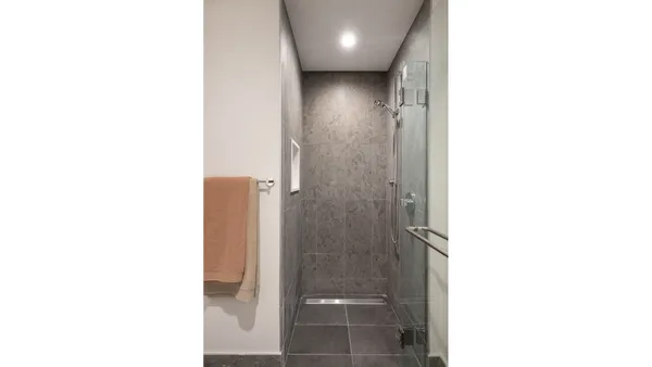 a kitchen with a refrigerator and a stove