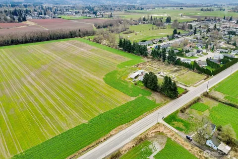 a view of a field with an outdoor space