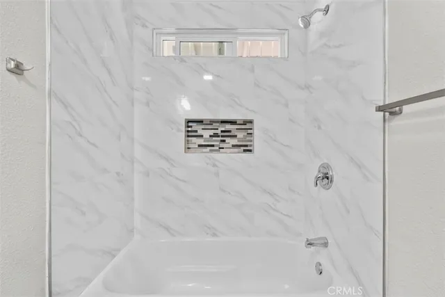 a bathroom with a bathtub