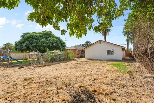 a house with trees in front of it