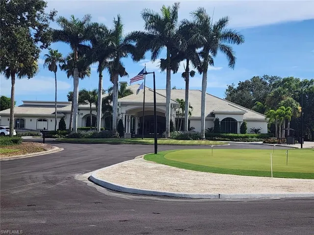 a house with palm tree in front of it