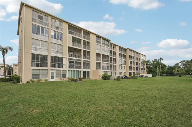 a view of building with yard
