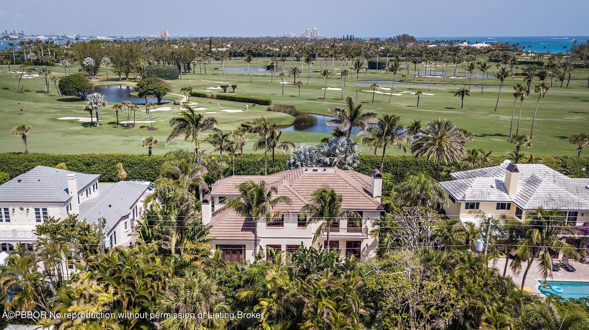 250 Country Club Road Palm Beach, FL 33480 - Photo 2 of 33 an aerial view of a houses with a lake view