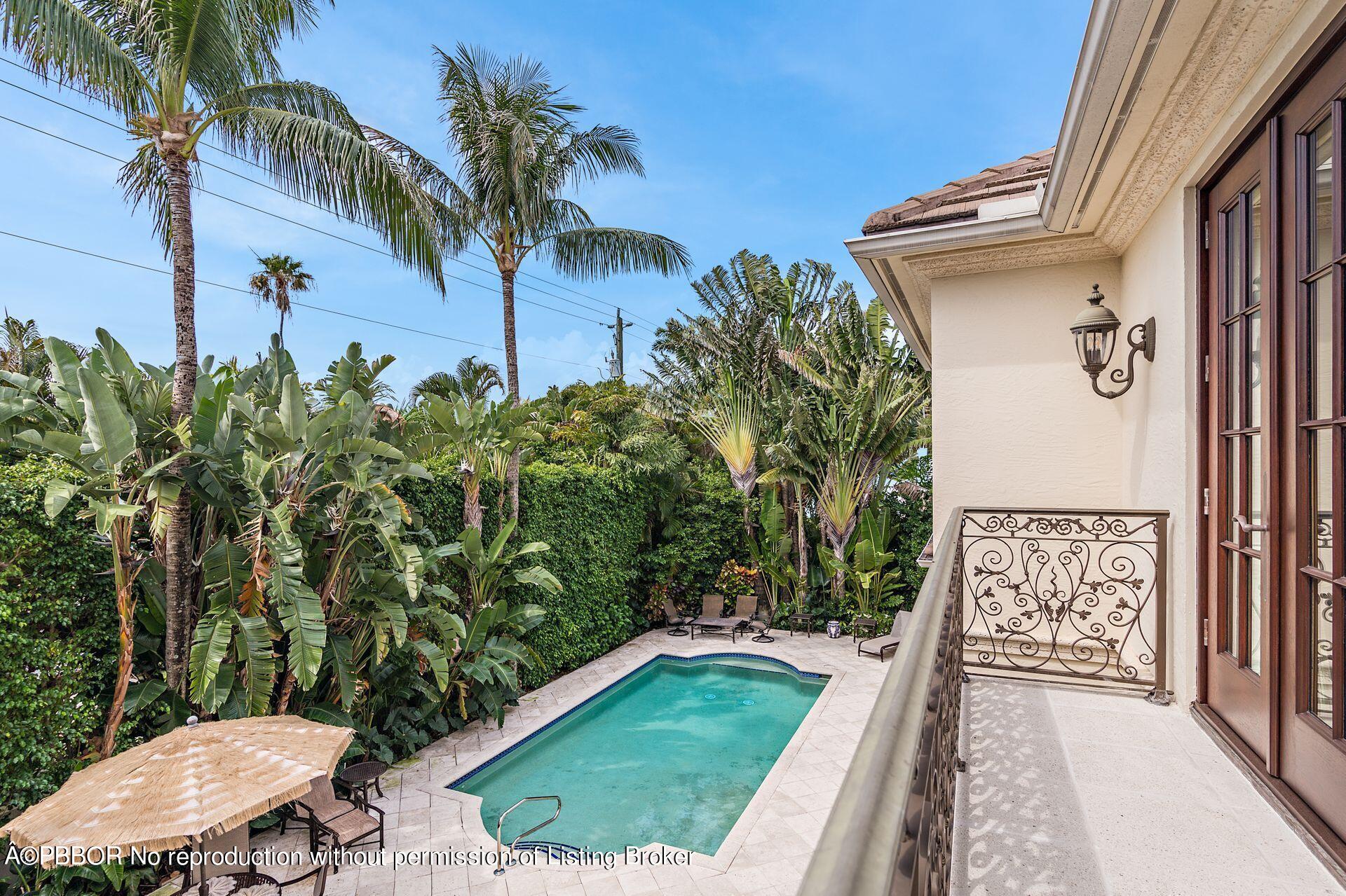 250 Country Club Road Palm Beach, FL 33480 - Photo 26 of 33 a view of a backyard with plants