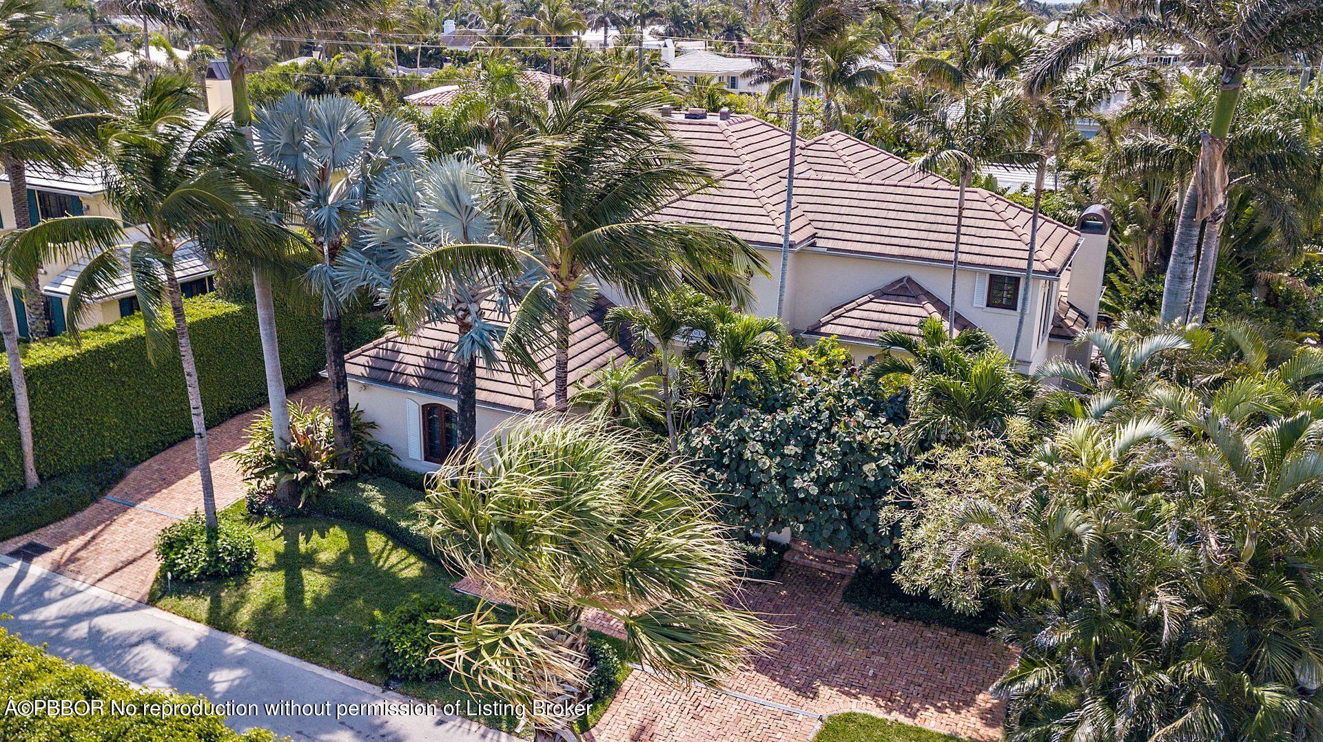 250 Country Club Road Palm Beach, FL 33480 - Photo 31 of 33 a front view of a house with a yard