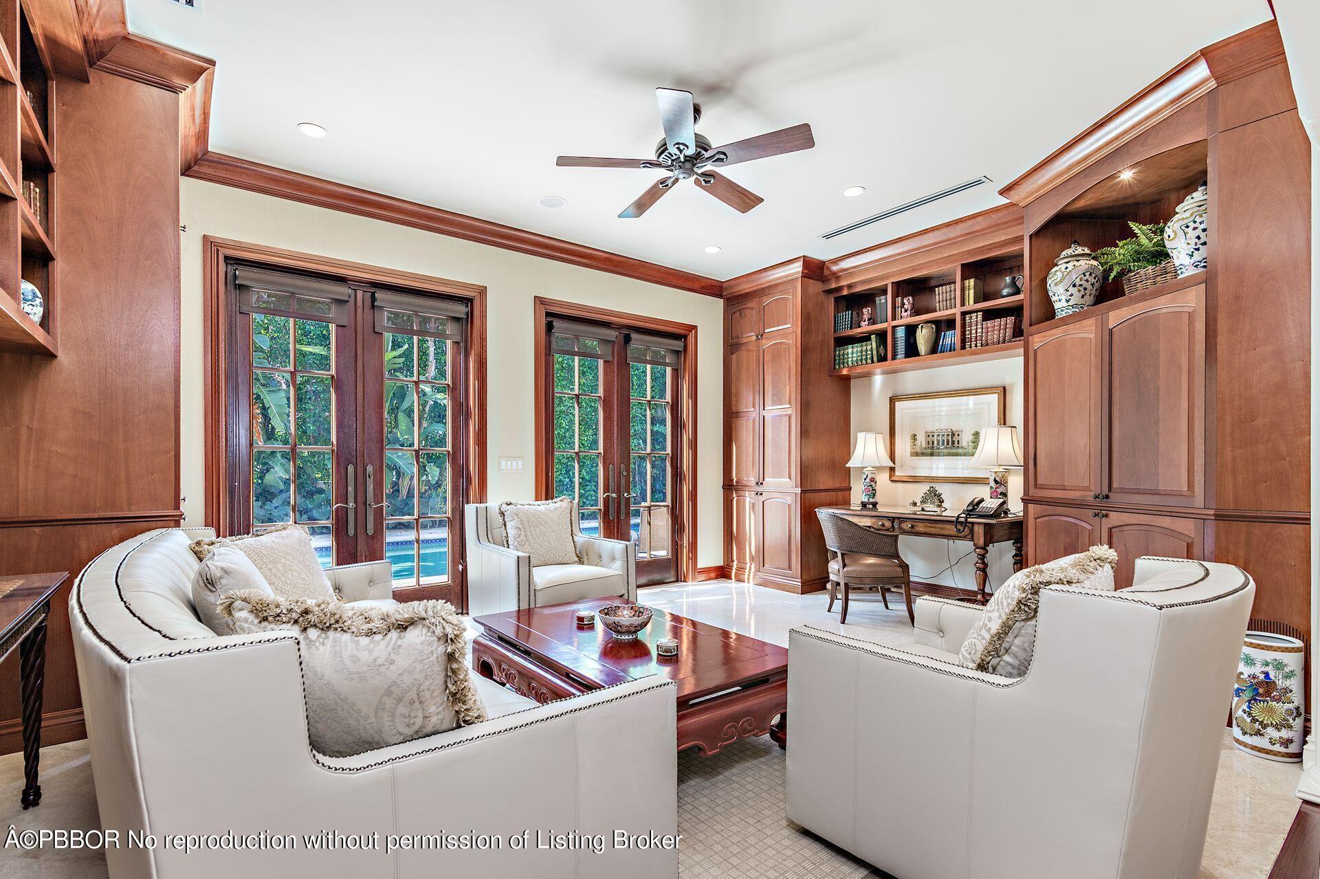250 Country Club Road Palm Beach, FL 33480 - Photo 6 of 33 a living room with furniture and a large window