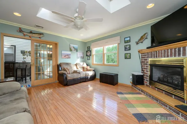 a bedroom with furniture and a fireplace