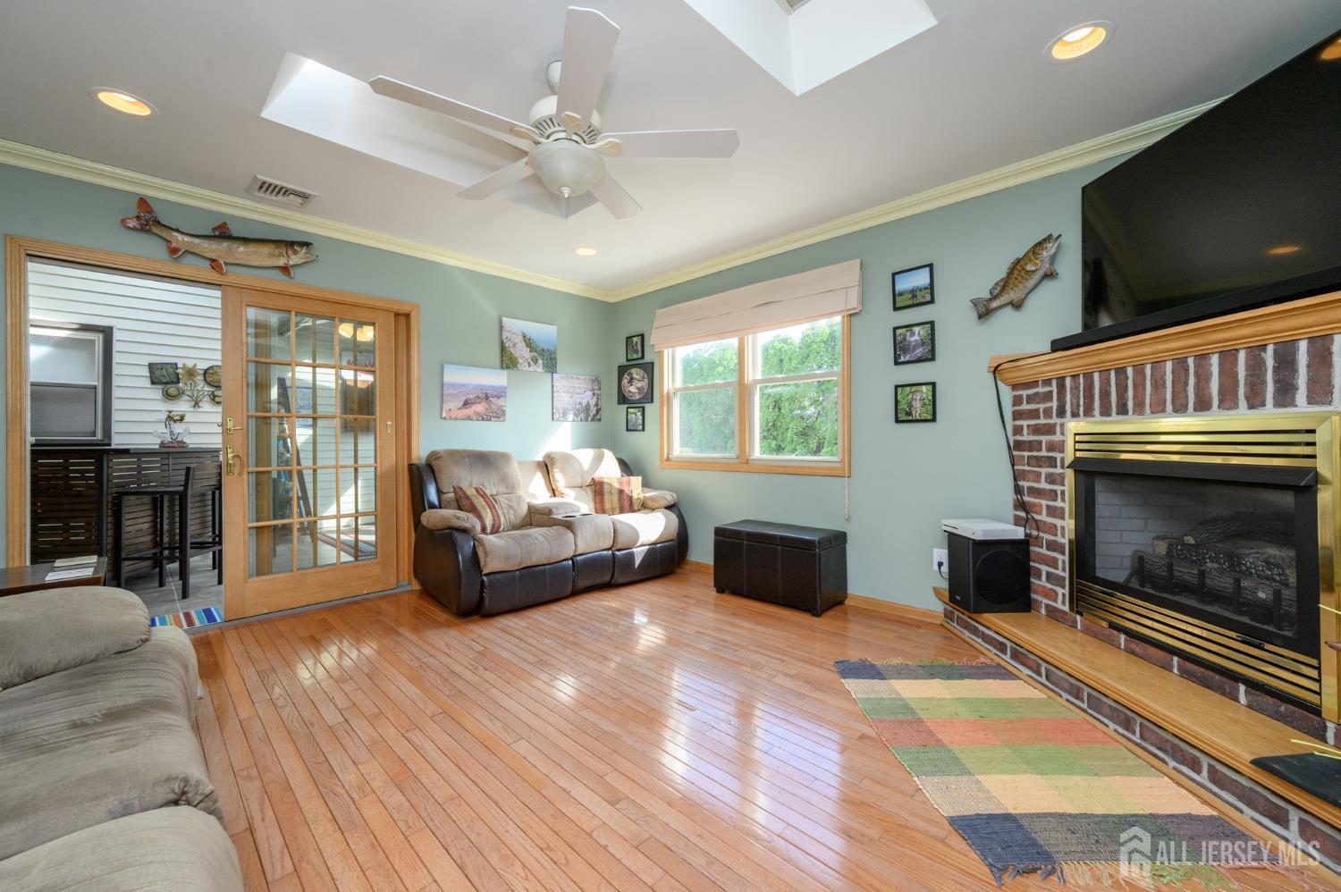 10 Eric Drive Howell, NJ 07731 - Photo 13 of 43 a bedroom with furniture and a fireplace