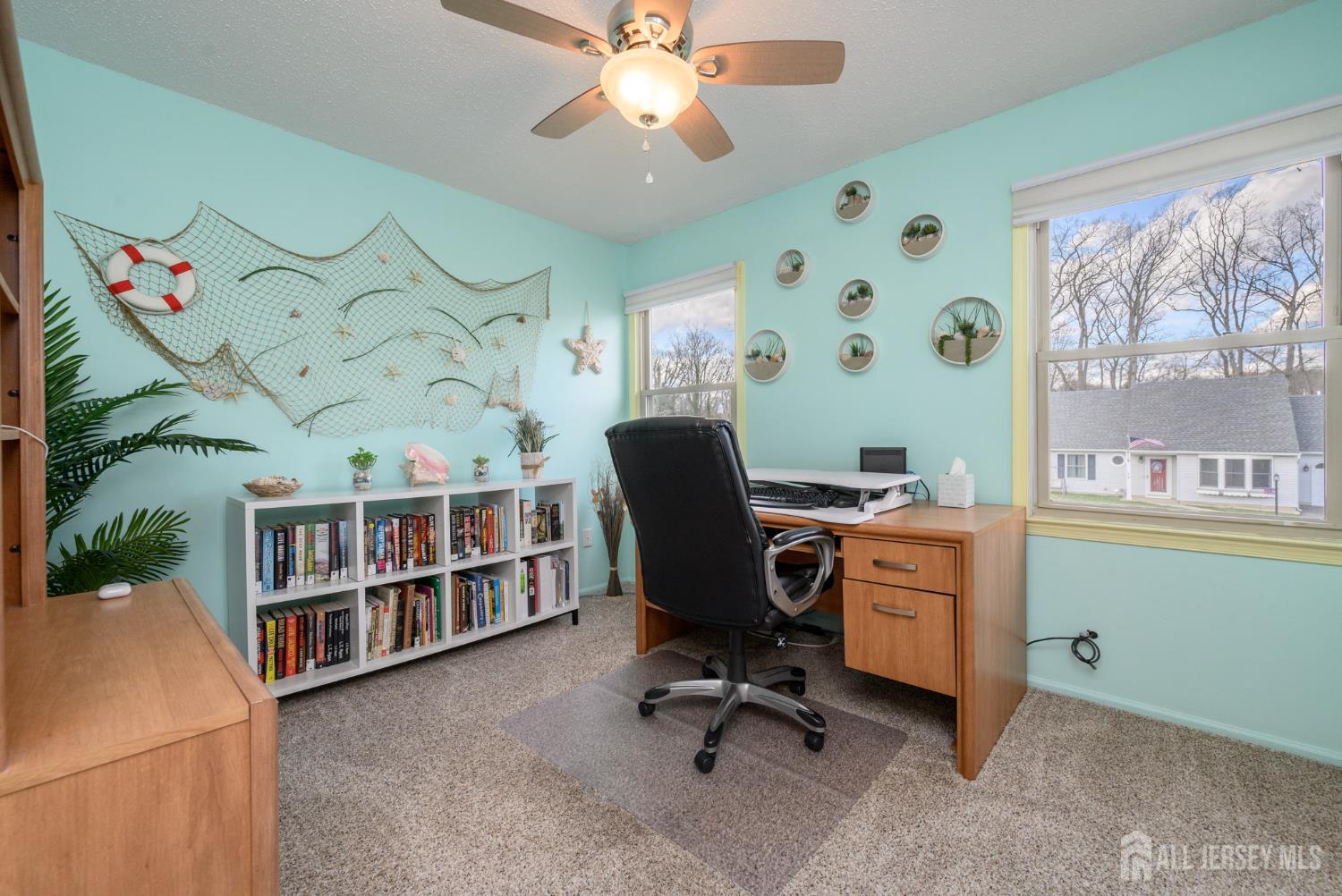 10 Eric Drive Howell, NJ 07731 - Photo 29 of 43 a view of a workspace with furniture and a window
