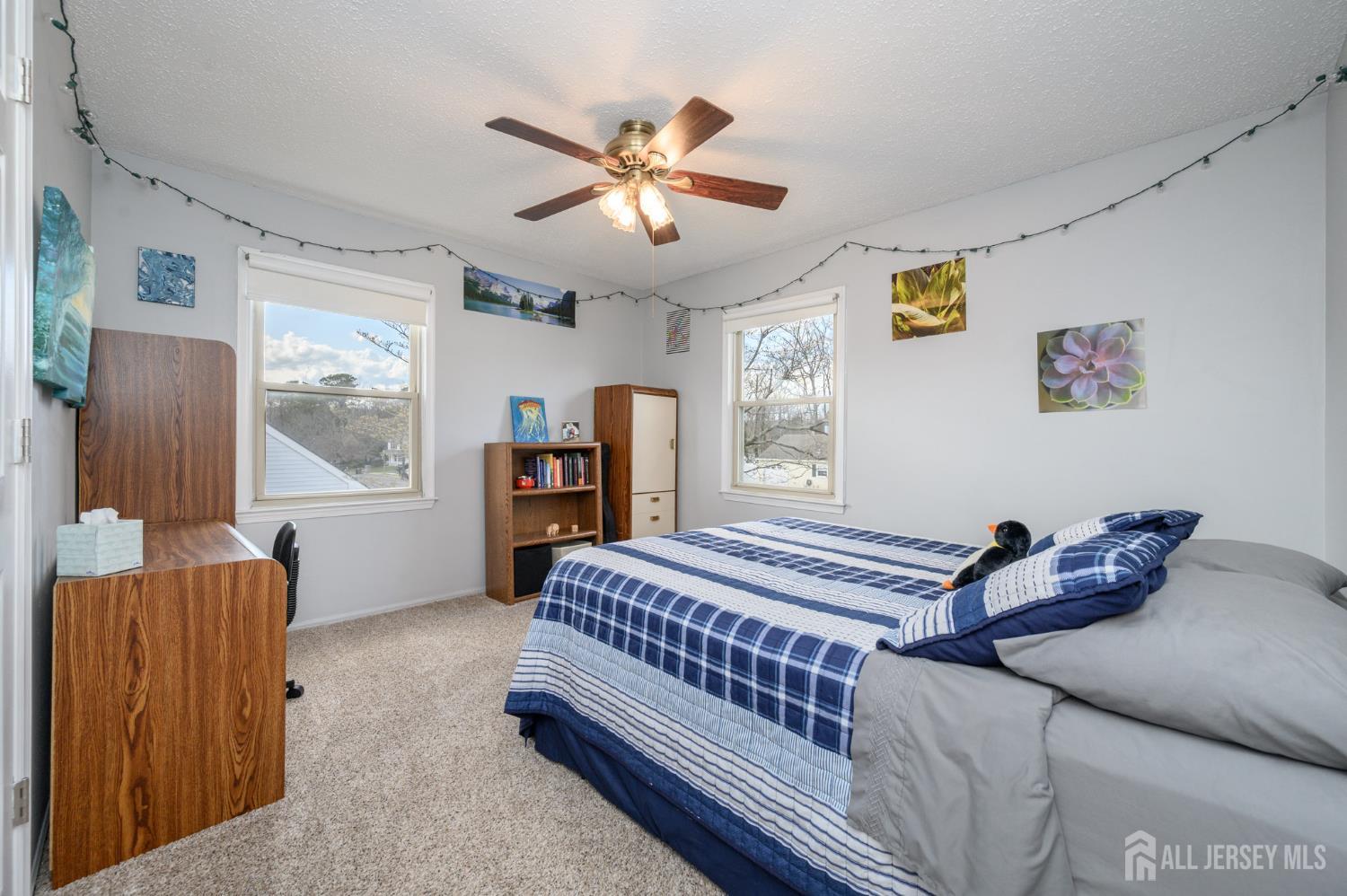 10 Eric Drive Howell, NJ 07731 - Photo 33 of 43 a bedroom with a bed and window