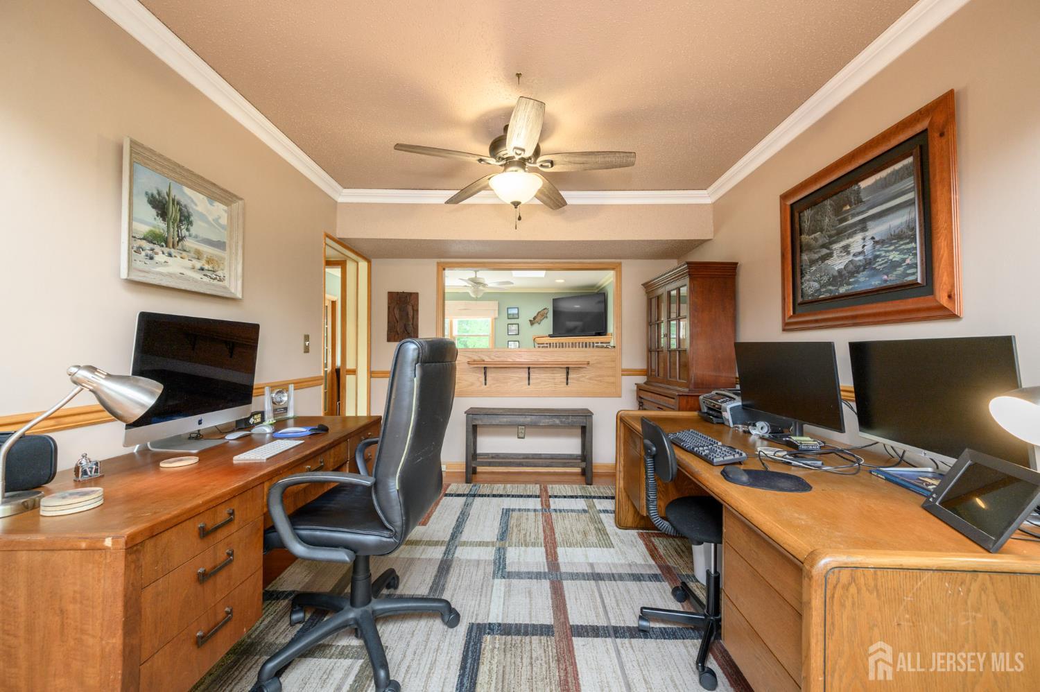 10 Eric Drive Howell, NJ 07731 - Photo 6 of 43 a workspace with furniture and a fireplace